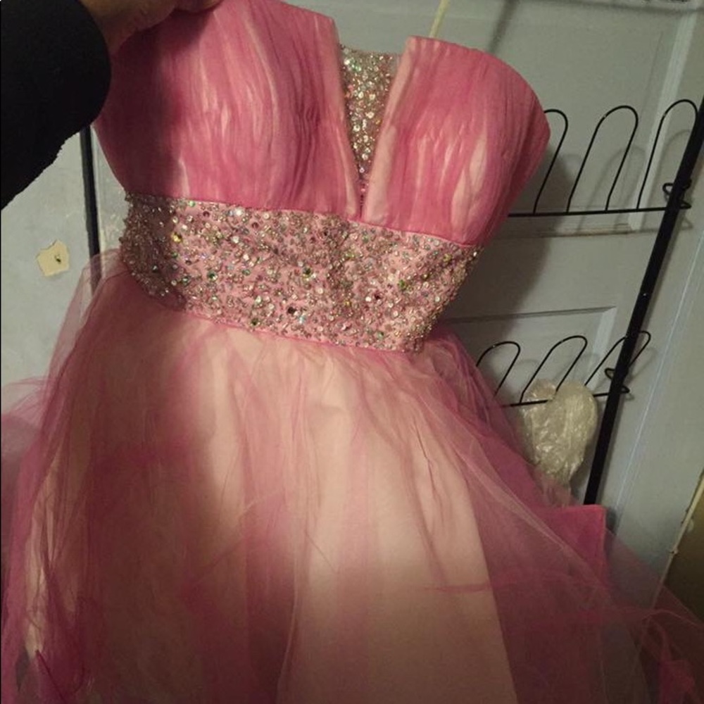 3 prom dresses and a pair of prom shoes